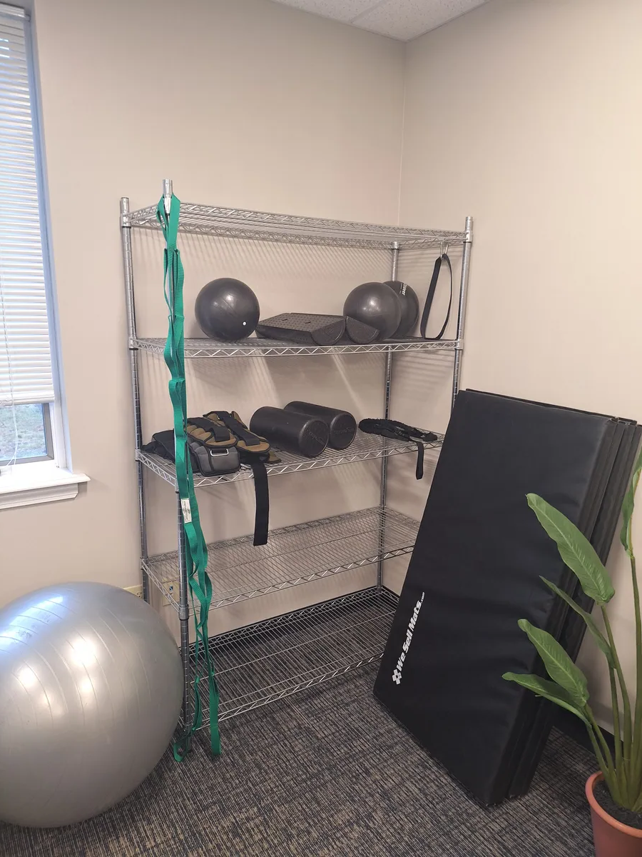 green fern plant inside clear glass vase